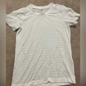 White lululemon shirt w little holes